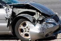 Collision-damaged vehicle in for repair at River Valley Collision